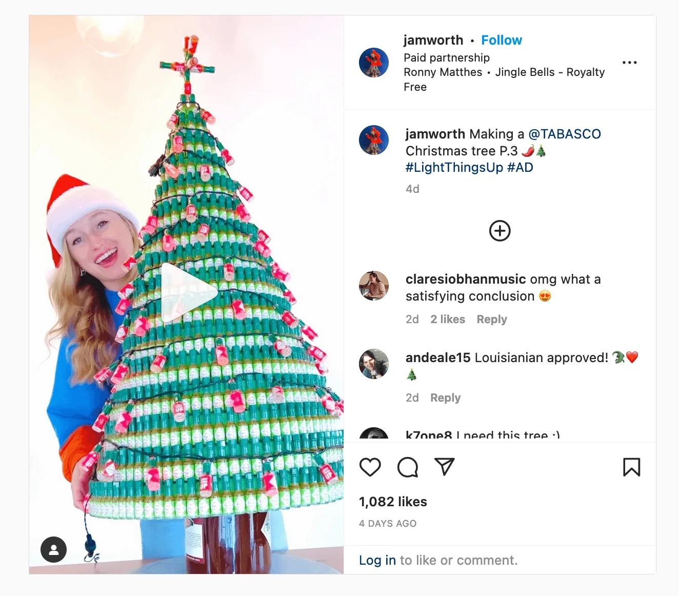 A screenshot of an Instagram post by @jamworth showing her with a Christmas tree made of Tabasco bottles