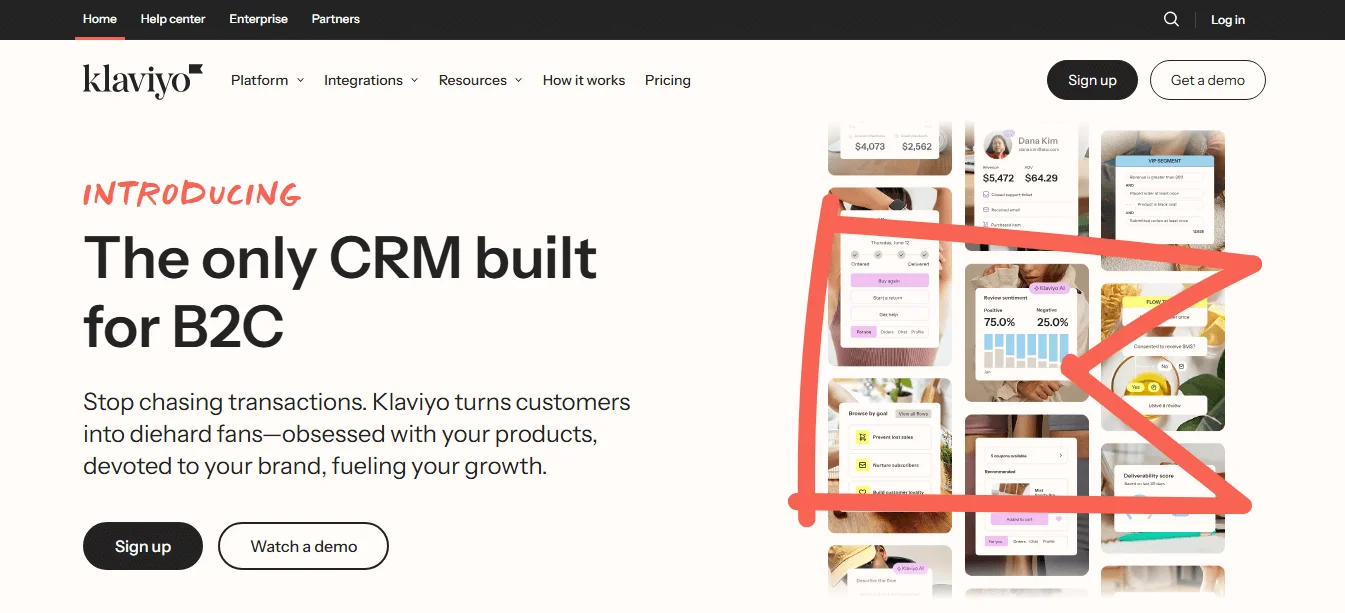 Klaviyo’s homepage showing its hero text, images of its dashboard, and call-to-action buttons to sign up and watch demo