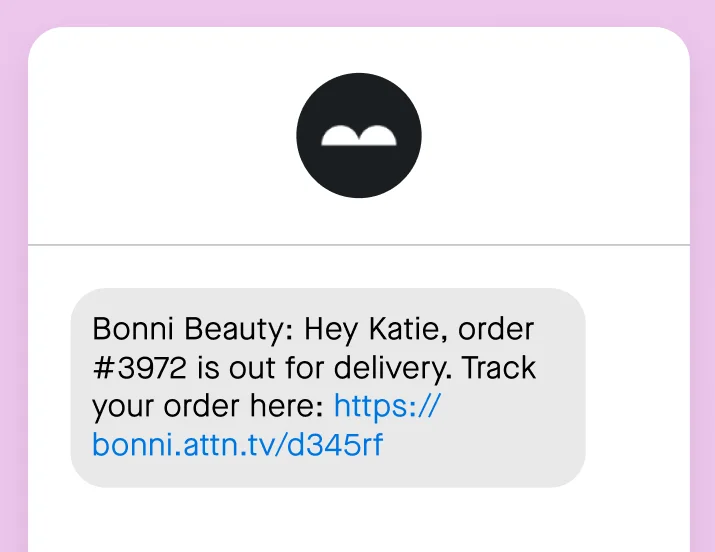 An SMS message with the text “Bonni Beauty: Hey Katie, order #3972 is out for delivery. Track your order here” and a link to track it