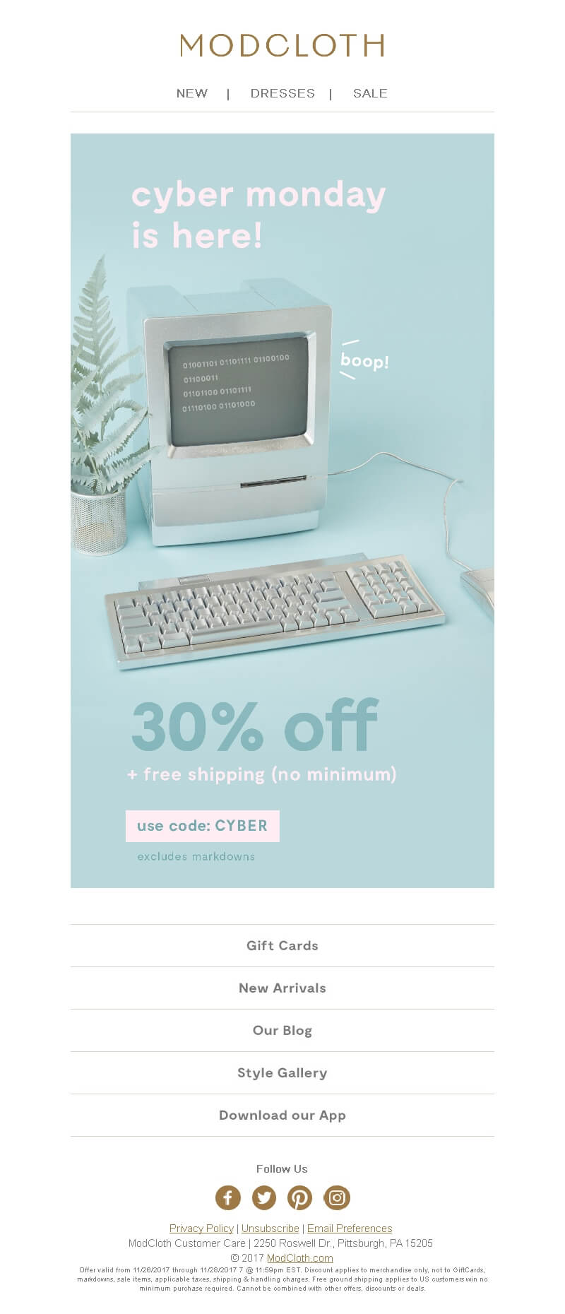 A Cyber Monday campaign with a retro computer displaying binary code and a word boop! near it.