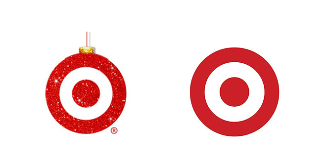 Two logos that belong to an American retailer, Target. One is for winter holidays and looks like a bauble covered in glitter. Another one is the red-and-white target that the brand uses everyday.