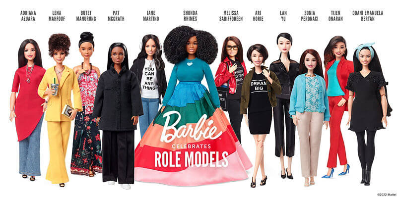 A photo of a collection of Barbie dolls celebrating women role models