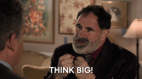 The Goldbergs character saying “Think big!”