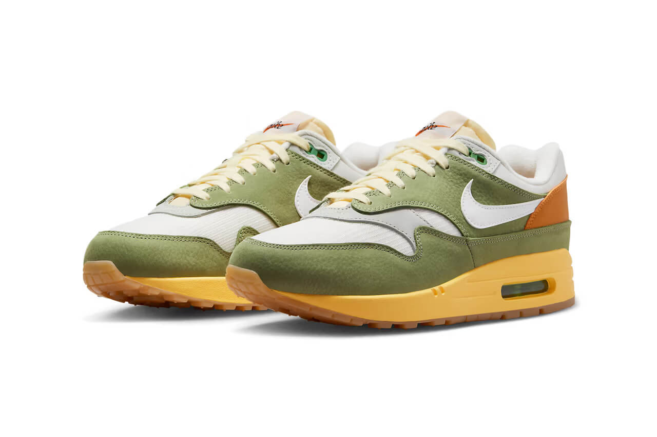 Nike Air Max 1 "Design by Japan" sneakers in rusty green, orange, and yellow colorway