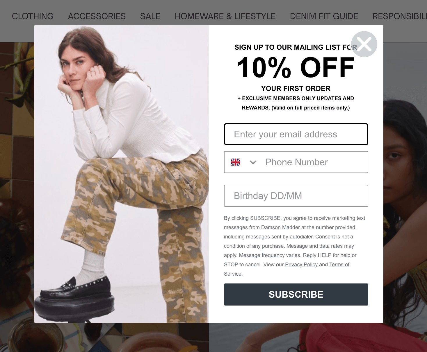 10% off pop-up from fashion brand Damson Madder with email, phone number, and birthday sign-up fields, promoting member-only rewards and updates with a lengthy privacy notice