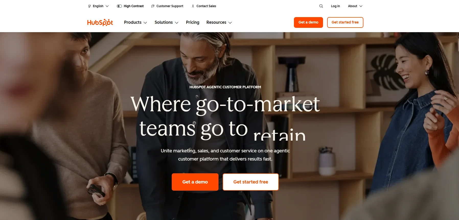 HubSpot homepage showing CRM platform interface and marketing tools dashboard