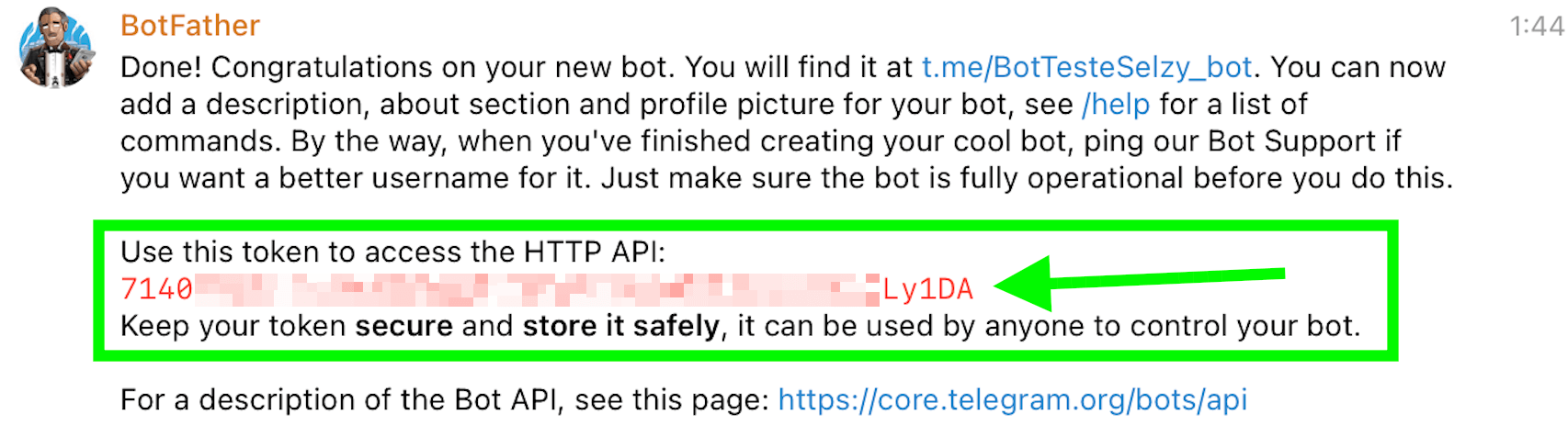 Uma mensagem do BotFather com um link para o bot e um token para ele. 